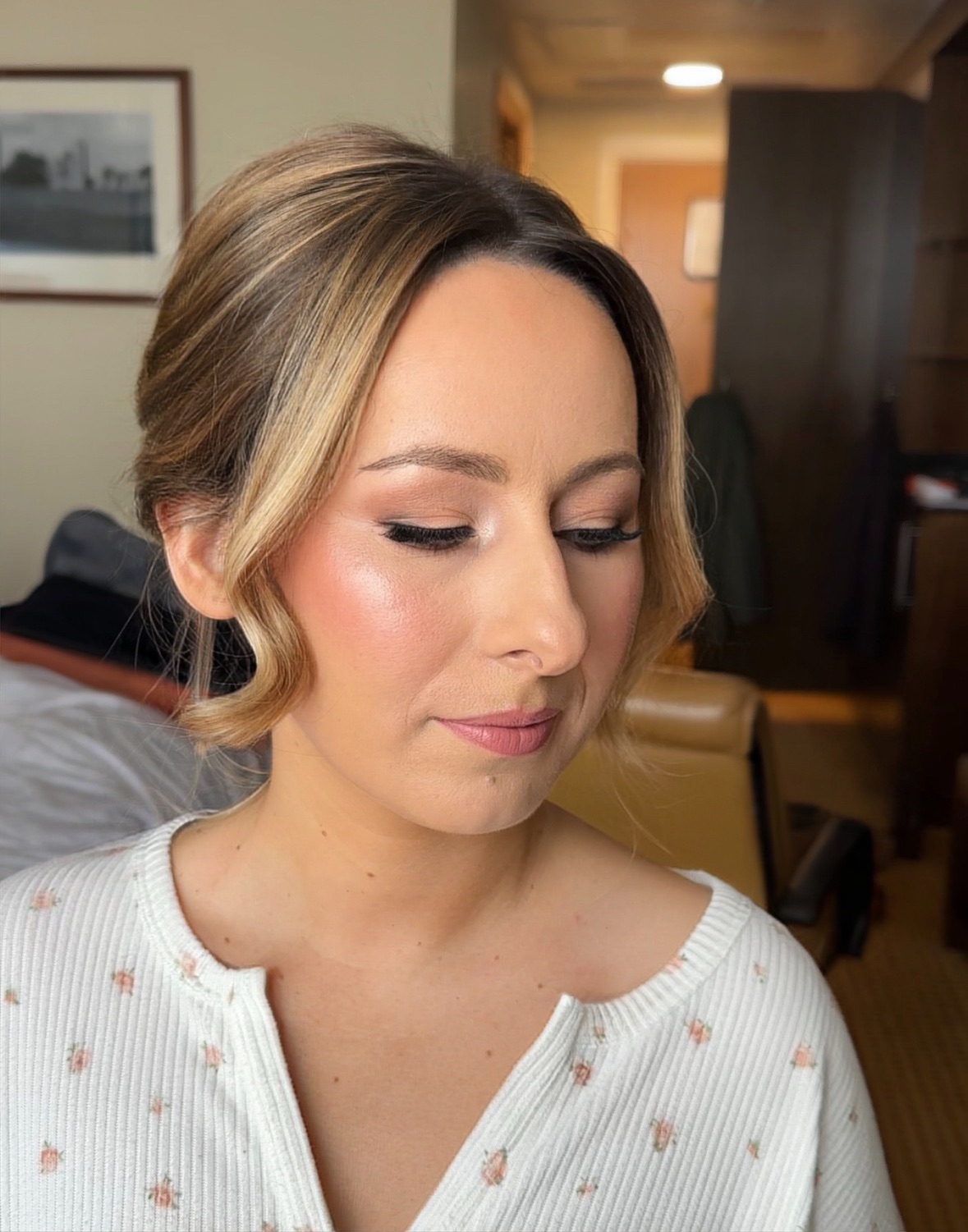Jennifer after her bridal soft glam makeup — glowing even base, soft blush, defined eyes with lashes and a mauve-pink lip