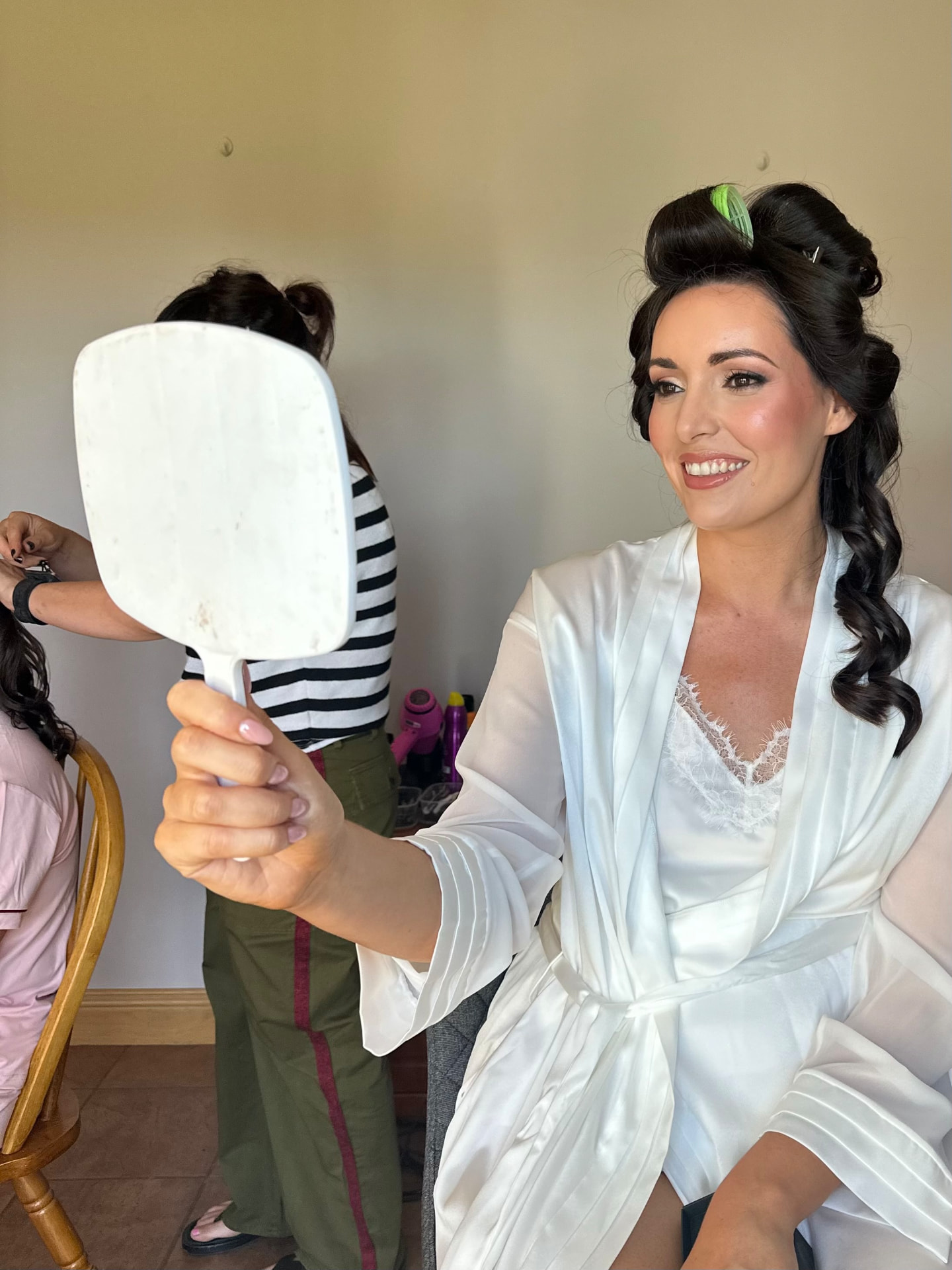 Bride having final makeup touches before her Wexford country house wedding